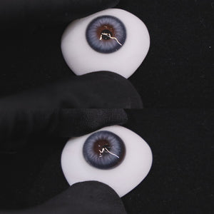 Wooeye Nut Blue Contact Lenses on a brown simulated eyeball with a black background