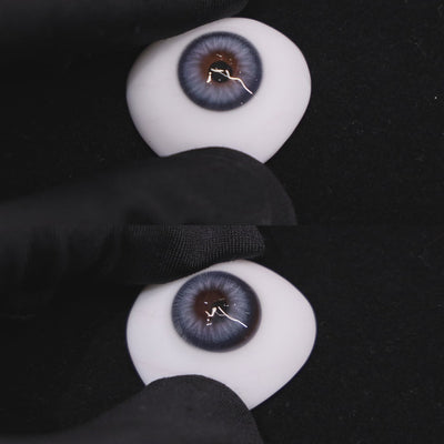 Wooeye Nut Blue Contact Lenses on a brown simulated eyeball with a black background